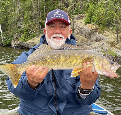 Steve Paulson Group Members with a Walleye